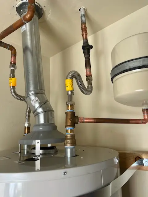 Water heater installation and plumbing repair in Scrapetown